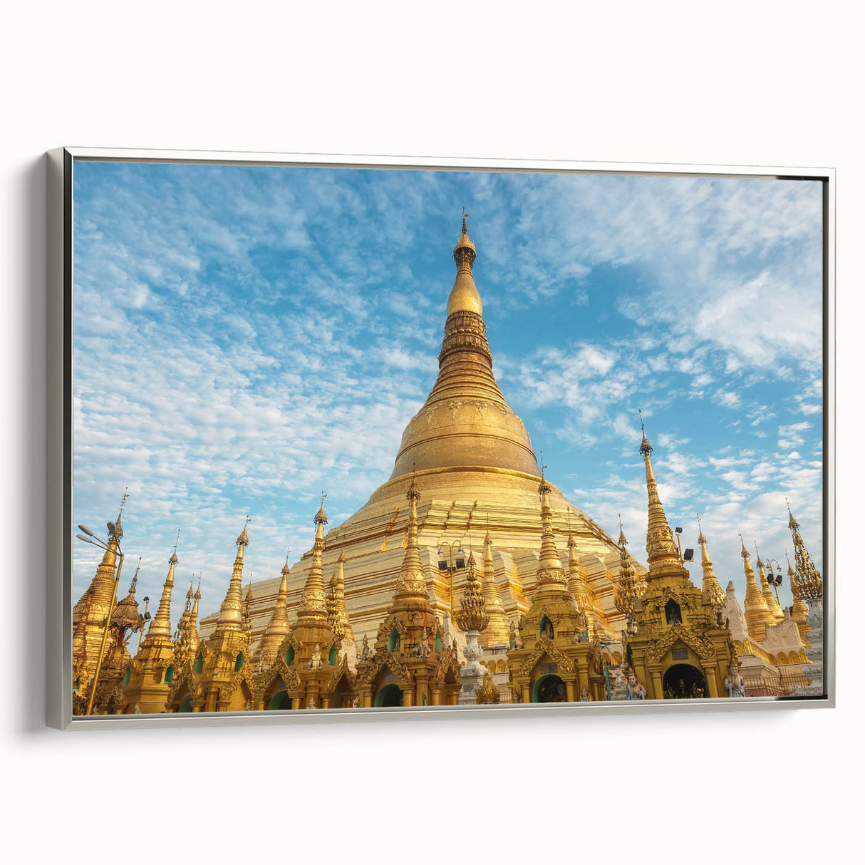 Framed canvas featuring a vintage-style landscape painting of a Myanmar scenery in black with colorful accents.