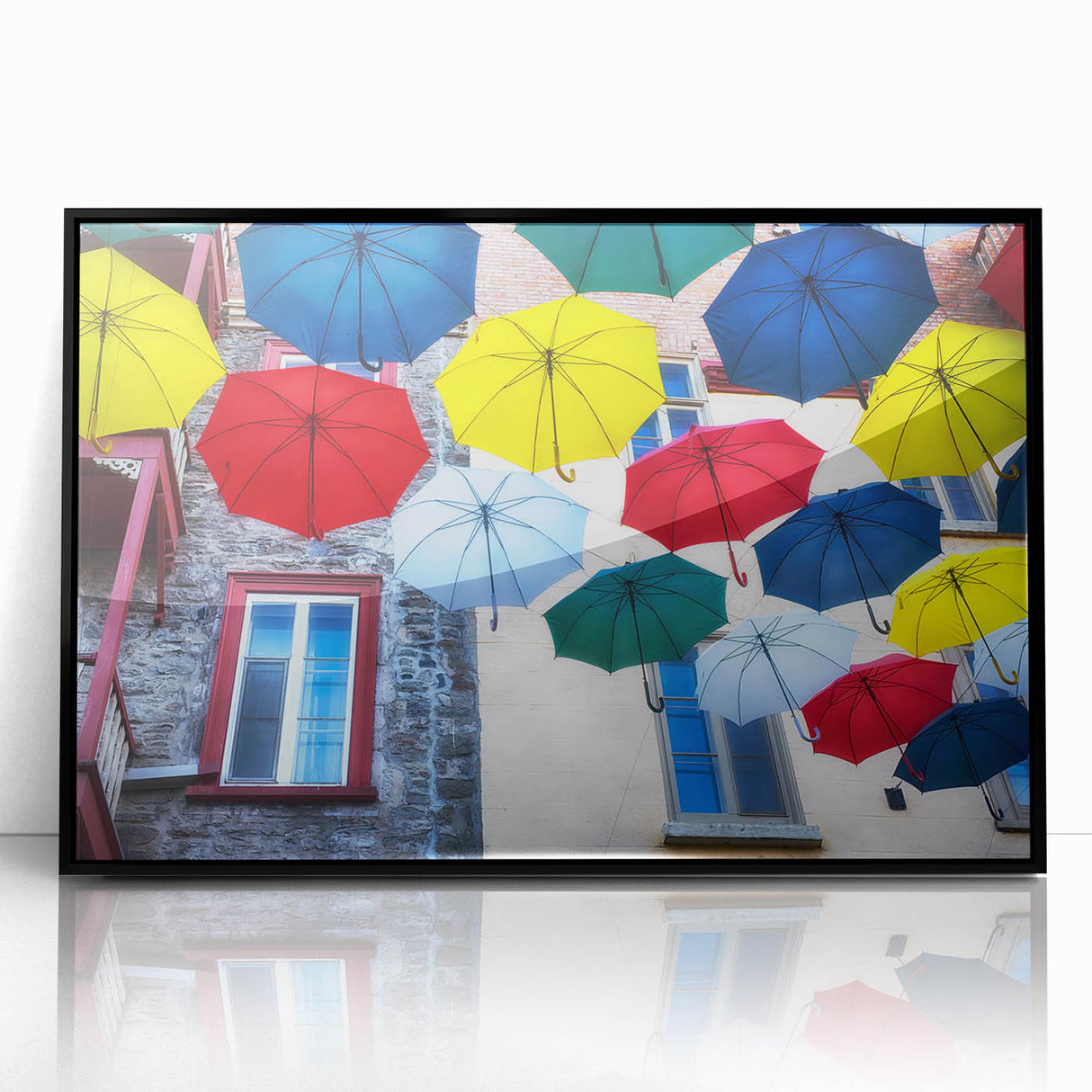 Large abstract wall art depicting a Quebec scenery in muted earth tones on a black framed acrylic.