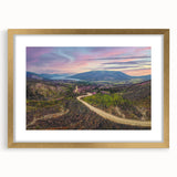 Extra large abstract art print depicting Yukon scenery in textured shades of blue and green, framed in gold.