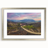 Textured art print of abstract Yukon scenery in muted earth tones, framed in silver, suitable for bedroom decor.