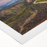 Art deco poster of the Yukon scenery in muted earth tones on rolled canvas, suitable for dining room wall art.