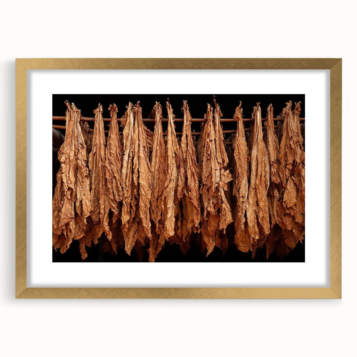 Textured abstract art print featuring a Caribbean-inspired scenery in muted earth tones, framed in gold.