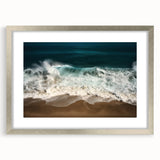 Extra large wall art of an abstract Caribbean scenery in textured tones of blue and green, framed in silver.