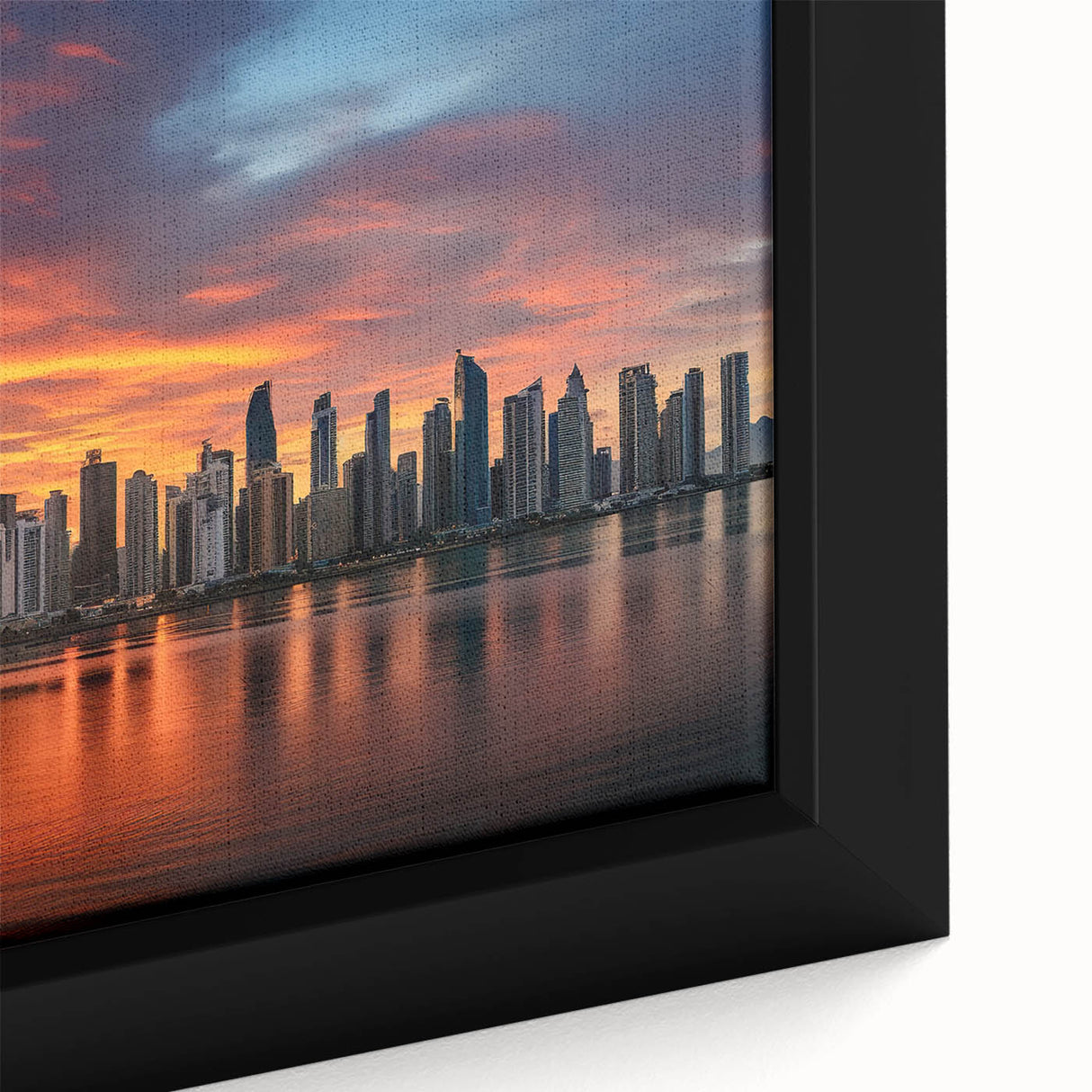 Extra large framed canvas featuring a textured depiction of a Central American scenery in black with colorful accents.