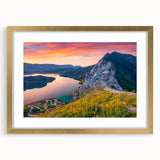 Abstract art print of an Albanian landscape in muted gold and green tones on a framed canvas, suitable for dining room decor.