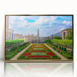 Art deco poster depicting a serene European landscape in muted gold tones on a framed acrylic.