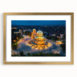 Abstract art print of a European landscape in gold frame with mat, featuring muted earth tones, ideal for dining room decor.