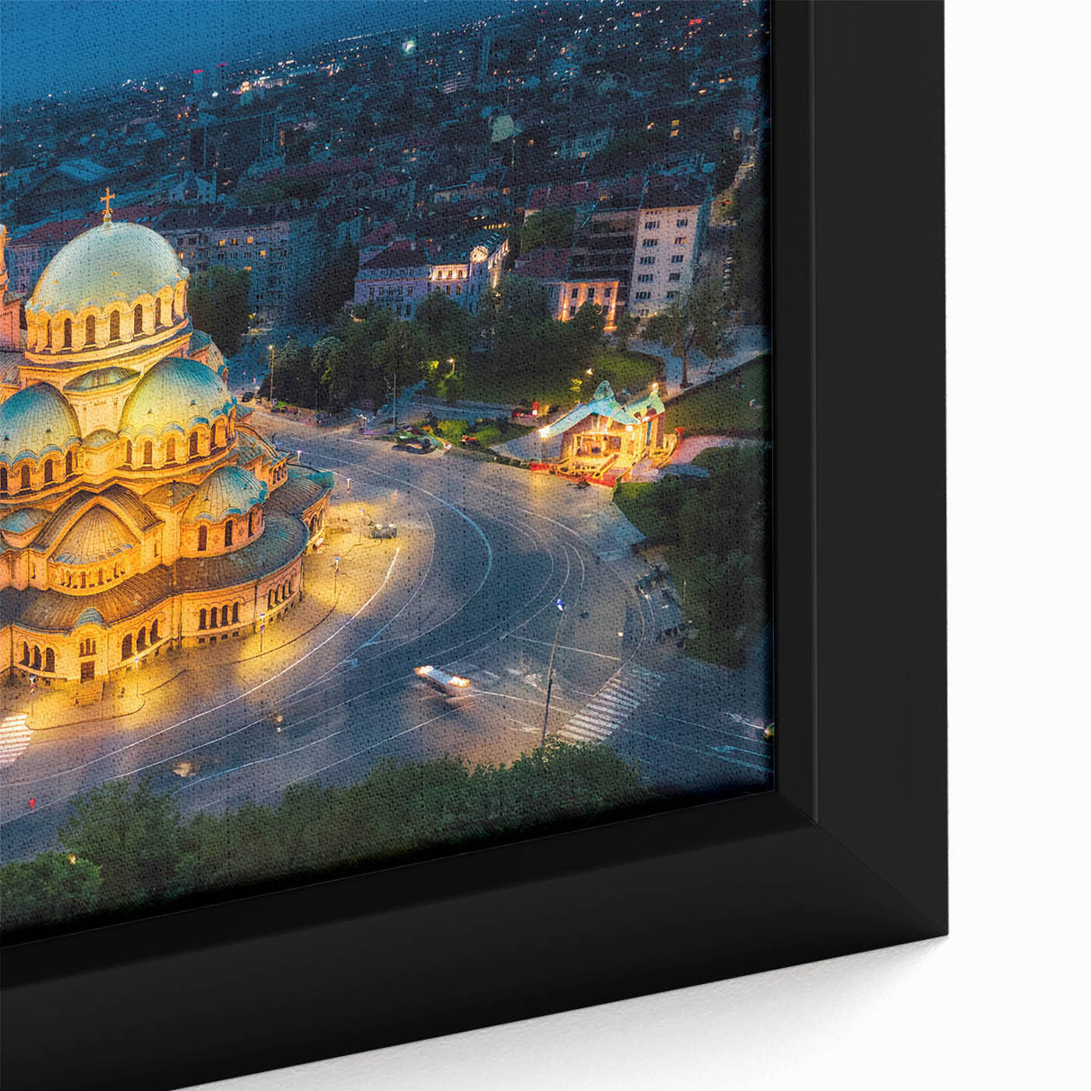 Close-up of black wall art featuring a textured, colorful Bulgarian landscape on a framed canvas.