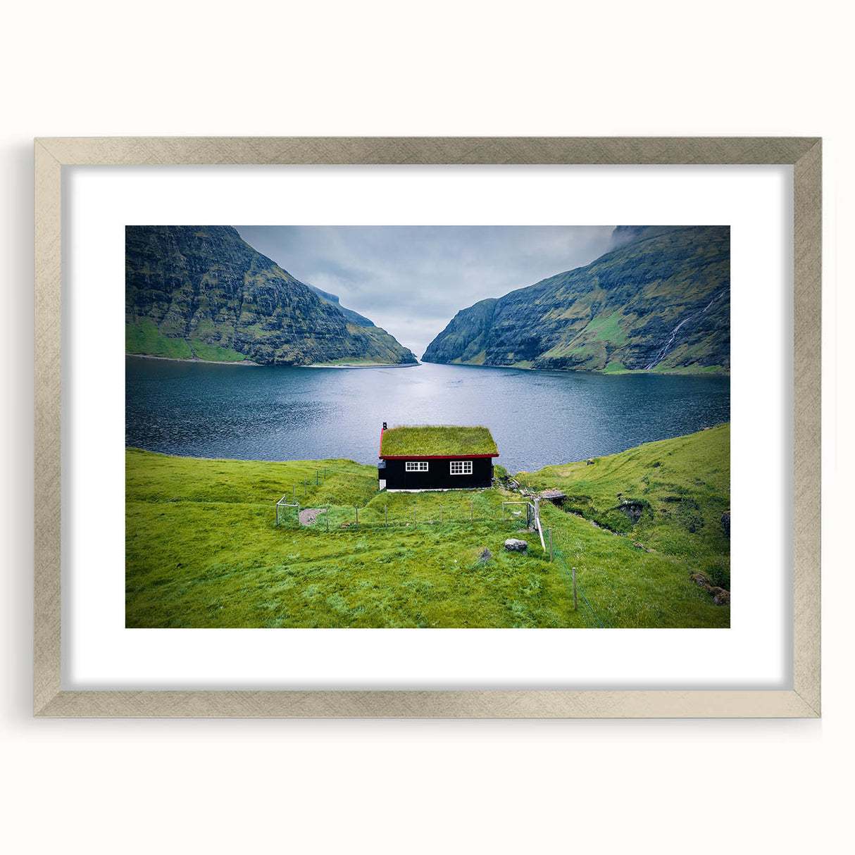 Extra large abstract art print depicting a textured European scenery in muted earth tones, framed in silver.