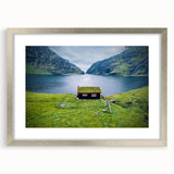 Extra large abstract art print depicting a textured European scenery in muted earth tones, framed in silver.