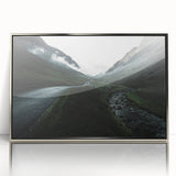 Large art print of a serene Cumbria landscape in muted green and blue tones on a silver-framed acrylic.