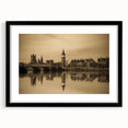 Colorful abstract art print of London scenery in vibrant hues on a large textured canvas, framed in black.