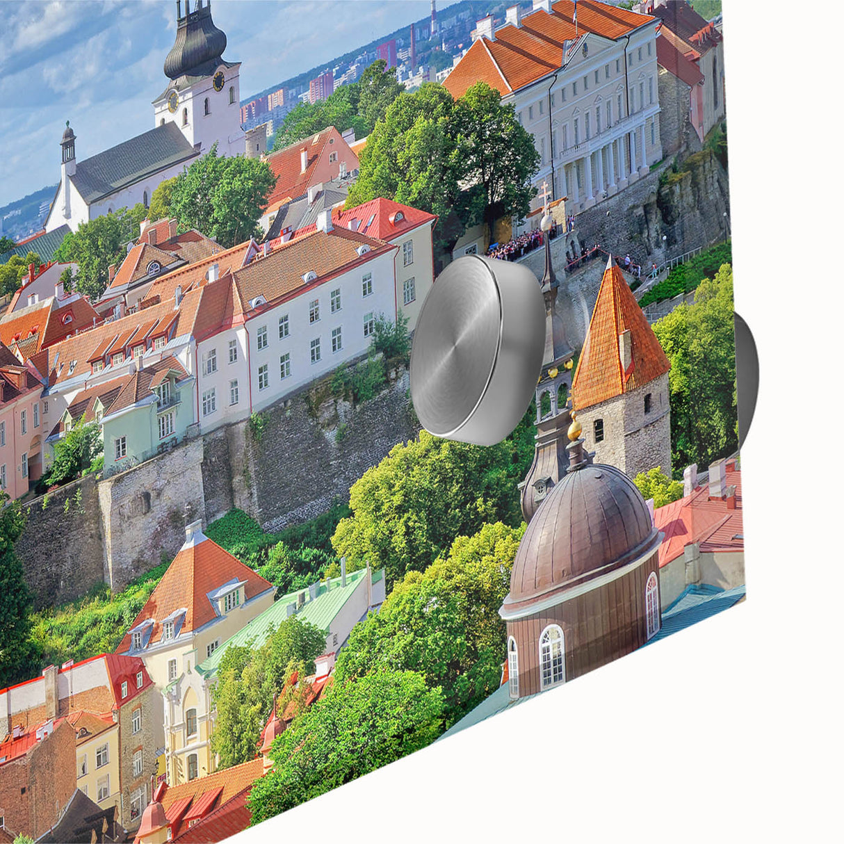 Large abstract wall art of a European cityscape in muted gray and blue tones on acrylic glass.
