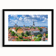 Extra large abstract art print of a colorful, textured European scenery on a black framed canvas.
