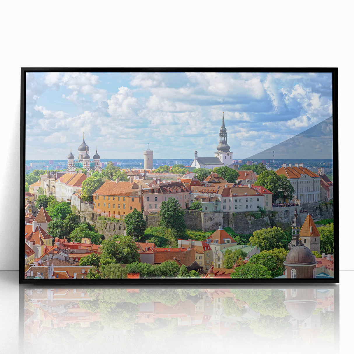 Large abstract wall art featuring soft gray and blue tones of a European scenery on a framed acrylic.