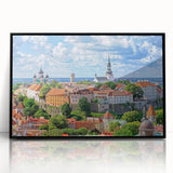 Large abstract wall art featuring soft gray and blue tones of a European scenery on a framed acrylic.