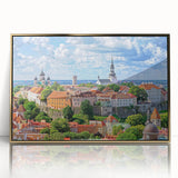 Framed acrylic print of a European cityscape in art deco style, featuring gold and blue tones.