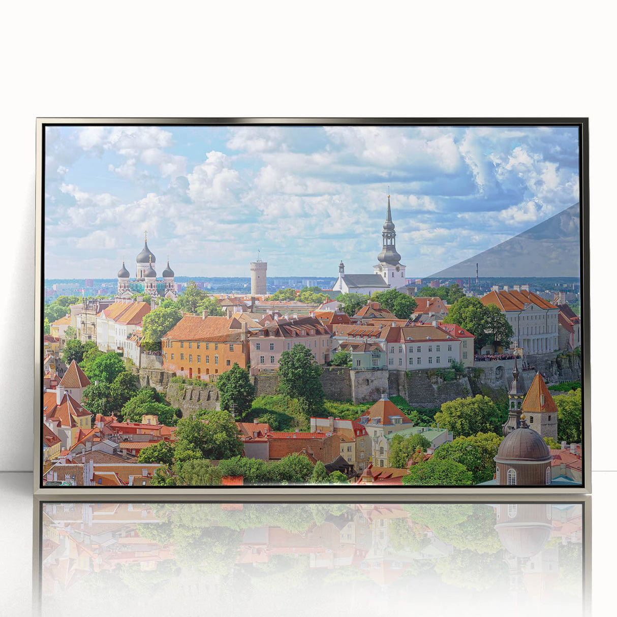 Large art print of a European Estonian landscape in muted green and blue tones, framed in silver acrylic.