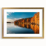 Abstract art print of a serene Finnish landscape in muted blue and gray tones on a framed canvas.