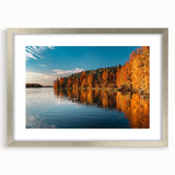 Extra large abstract art print depicting a textured Finnish landscape in muted earth tones, framed with a silver mat.