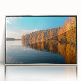 Large art print of a serene Finnish landscape in muted blue and green tones on framed acrylic.