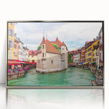 Large art print of the French Alps in muted green and blue tones, framed in silver acrylic.