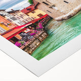 Art deco poster of the French Alps in muted earth tones on rolled canvas, suitable for dining room decor.