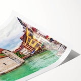 Extra large wall art featuring line art flowers over a scenic view of the French Alps, in muted earth tones on rolled print.