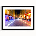 Extra large abstract art print of Lyon scenery in vibrant colors on a textured canvas, framed in black.