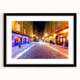 Extra large abstract art print of Lyon scenery in vibrant colors on a textured canvas, framed in black.