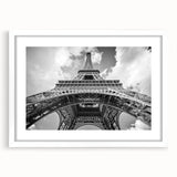 Textured art print of an abstract Parisian cityscape in muted earth tones on a framed white mat, ideal for bedroom decor.