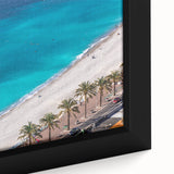 Extra large framed canvas depicting a textured, colorful European village scene in predominantly black tones.