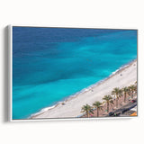 Vintage poster art of a scenic French village on a framed canvas, featuring colorful art in pastel shades.