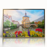 Acrylic print of a Bavarian landscape in muted green and blue tones, framed in gold, suitable for modern art wall decor.