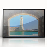 Large abstract wall art depicting the Crete coastline in muted blue and white tones, framed in black acrylic.