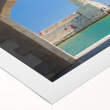 Art deco poster of Crete scenery in muted blue and white tones on rolled canvas, suitable for dining room wall art.