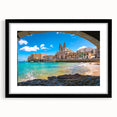 Colorful abstract art print of a European Malta scenery in vibrant hues on a large textured canvas, framed in black.