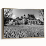 Framed canvas of a vintage-style landscape painting depicting the Montenegro scenery, in muted gold and black tones.