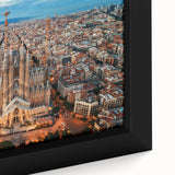 Extra large framed canvas of a textured Barcelona cityscape in black with colorful accents, ideal for living room decor.