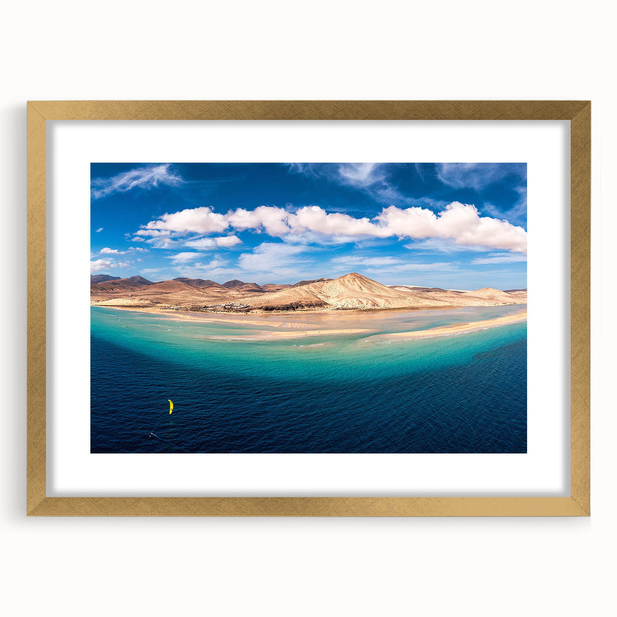 Abstract art print of a European scenery in muted earth tones, framed in gold, suitable for dining or bedroom decor.