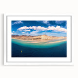 Textured abstract art print of a European scenery in muted earth tones, framed with a white mat, ideal for bedroom art.