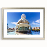 Textured abstract art print of Valencia scenery in muted earth tones, framed in silver, ideal for bedroom ambiance.