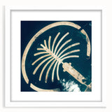 Abstract art print of Dubai skyline in muted gray and blue tones, framed with a white mat, ideal for dining room decor.