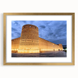 Extra large abstract art print of a Middle Eastern landscape in muted gold and earth tones on a textured canvas.