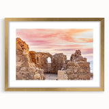 Extra large abstract art print depicting a textured Middle Eastern scenery in muted gold tones, framed with a mat.