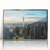 Framed acrylic print of Auckland skyline in muted blue tones, ideal for modern art wall decor.