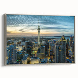 Framed canvas landscape art painting featuring a colorful Auckland skyline set against a black background.
