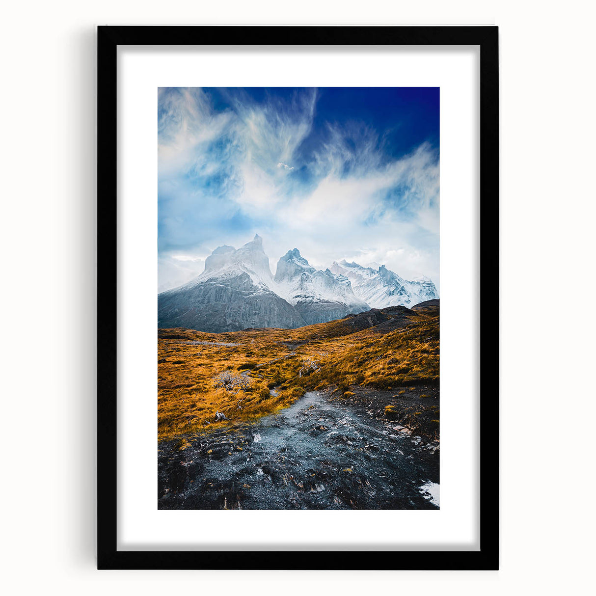 Extra large abstract art print of vibrant, colorful scenery resembling South America on a black framed canvas.