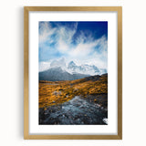 Extra large abstract art print featuring textured scenery of Chile, with muted earth tones, framed in gold.