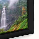 Extra large framed canvas featuring a textured depiction of a Colombian landscape in black with colorful art accents.